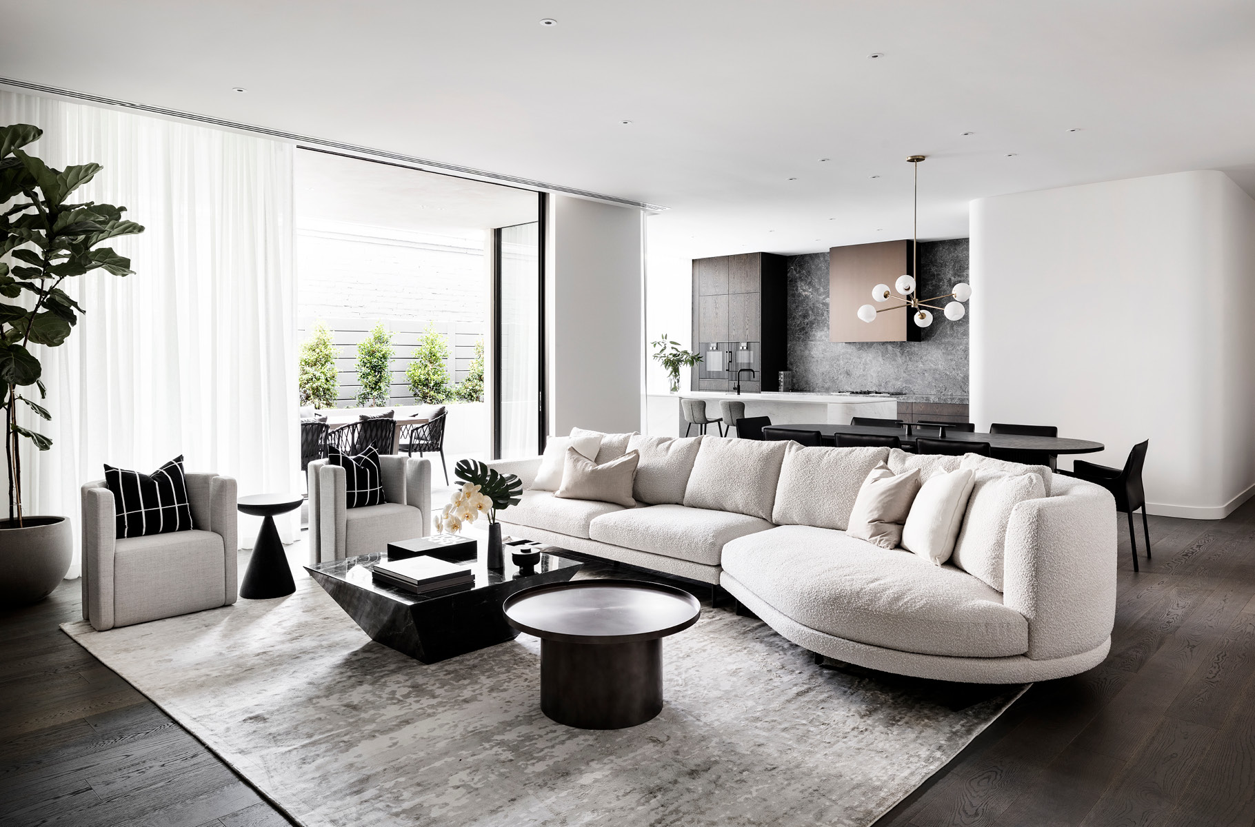 Pictured: Hugo Grand Right Chaise Set, Juno Moon Occasional Chairs, Livorno Luna Side Table, Elle Pedestal Lip Coffee Table & Elle Block Angled Coffee Table Pictured: Hugo Grand Right Chaise Set, Juno Moon Occasional Chairs, Livorno Luna Side Table, Elle Pedestal Lip Coffee Table & Elle Block Angled Coffee Table