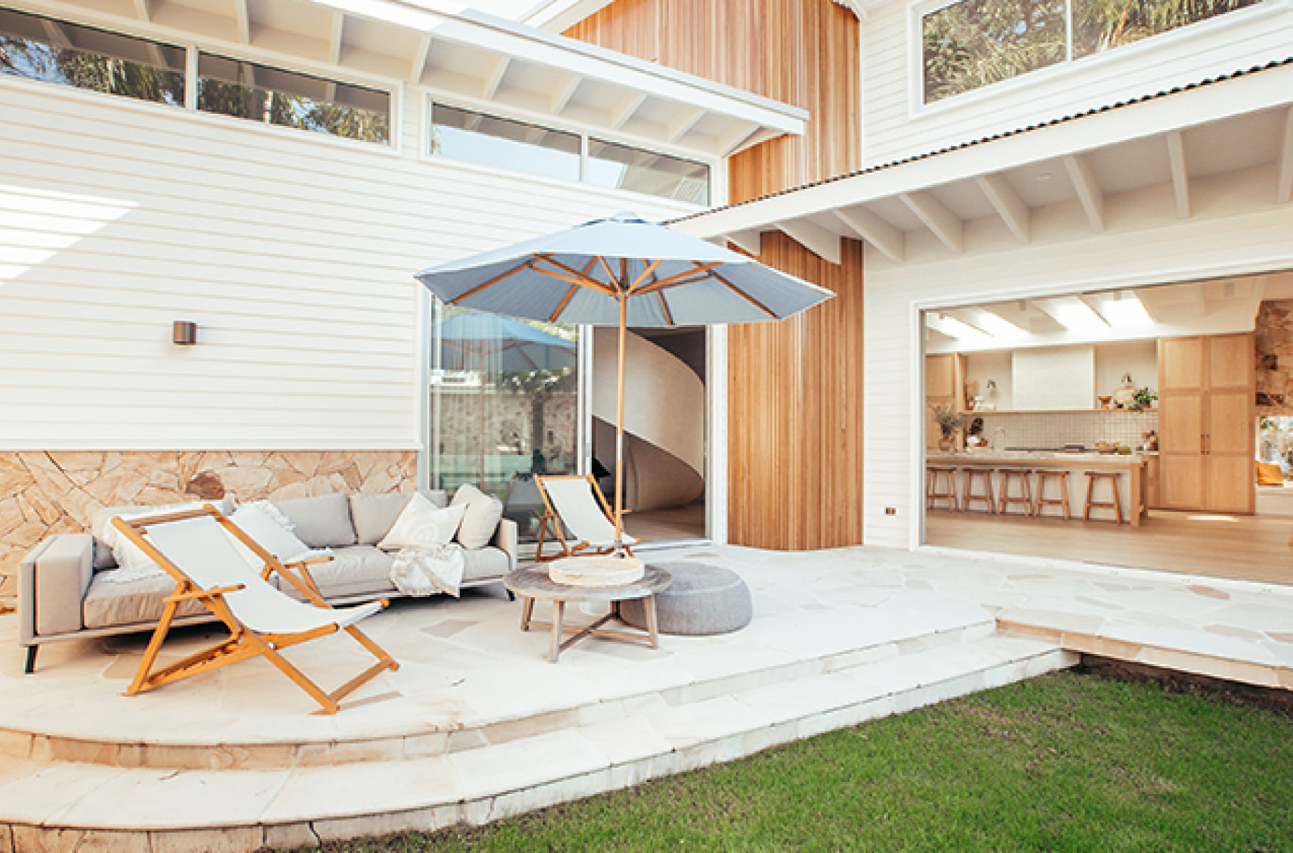 Pictured: Outdoor patio featuring the Aruba Square Left Chaise Pictured: Outdoor patio featuring the Aruba Square Left Chaise